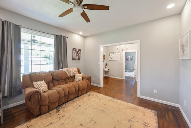 318 Church St, Clifton, TN 38425 - living area with ceiling fan, wood finished floors, a chandelier, baseboards, and recessed lighting