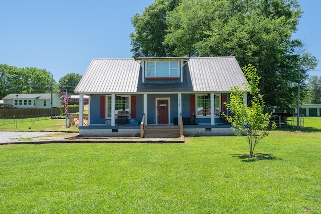 318 Church St, Clifton, TN 38425 - view of front of property featuring a porch, metal roof, and crawl space