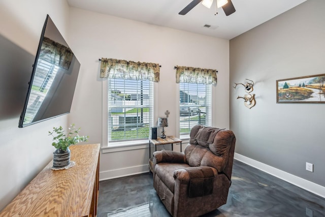 200 Nichols Dr, Woodbury, TN 37190 - sitting room featuring ceiling fan, plenty of natural light, baseboards, and concrete floors