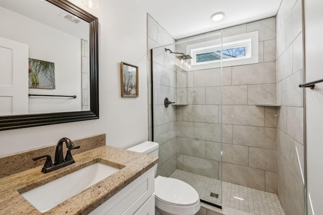 200 Nichols Dr, Woodbury, TN 37190 - bathroom featuring toilet, vanity, and tiled shower