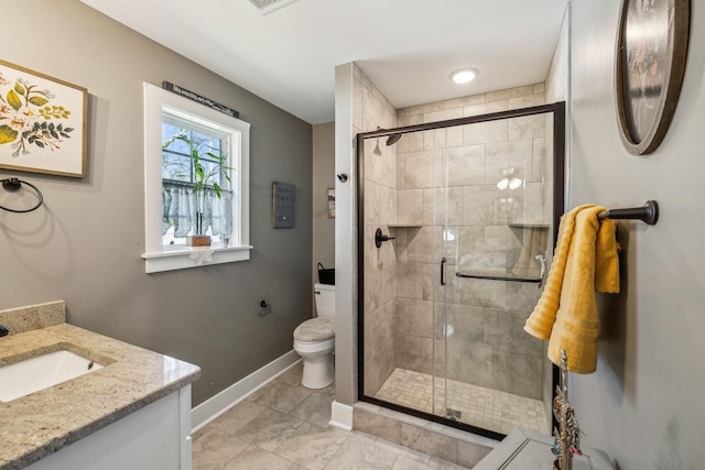 200 Nichols Dr, Woodbury, TN 37190 - full bathroom featuring vanity, baseboards, toilet, and a shower stall