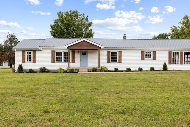 1371 Pomona Rd, Dickson, TN 37055 - ranch-style house with a front lawn and metal roof