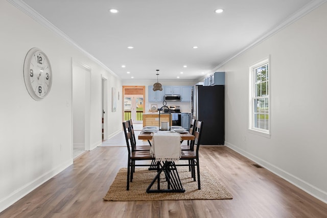1371 Pomona Rd, Dickson, TN 37055 - dining space with light wood-type flooring, baseboards, recessed lighting, and ornamental molding