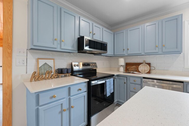 1371 Pomona Rd, Dickson, TN 37055 - kitchen with appliances with stainless steel finishes, blue cabinetry, decorative backsplash, and crown molding