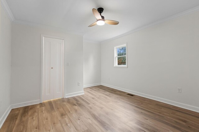 1371 Pomona Rd, Dickson, TN 37055 - spare room featuring ornamental molding, light wood finished floors, a ceiling fan, and baseboards