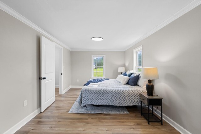 1371 Pomona Rd, Dickson, TN 37055 - bedroom with crown molding, baseboards, and wood finished floors