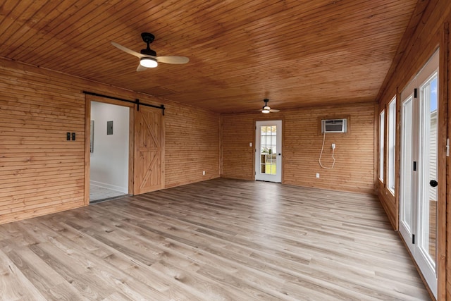 1371 Pomona Rd, Dickson, TN 37055 - unfurnished sunroom with a barn door and a wall unit AC