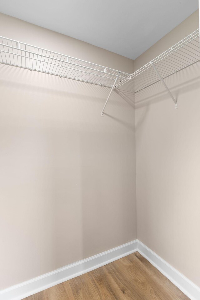 1371 Pomona Rd, Dickson, TN 37055 - walk in closet featuring light wood finished floors