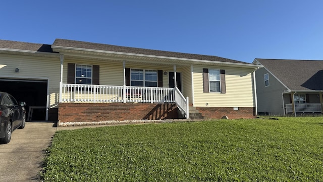 312 Pappy Dr, Oak Grove, KY 42262 - single story home with covered porch, a garage, a front lawn, concrete driveway, and crawl space