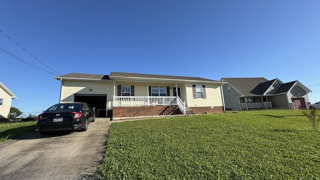 312 Pappy Dr, Oak Grove, KY 42262 - single story home with a porch, asphalt driveway, a garage, a front lawn, and crawl space