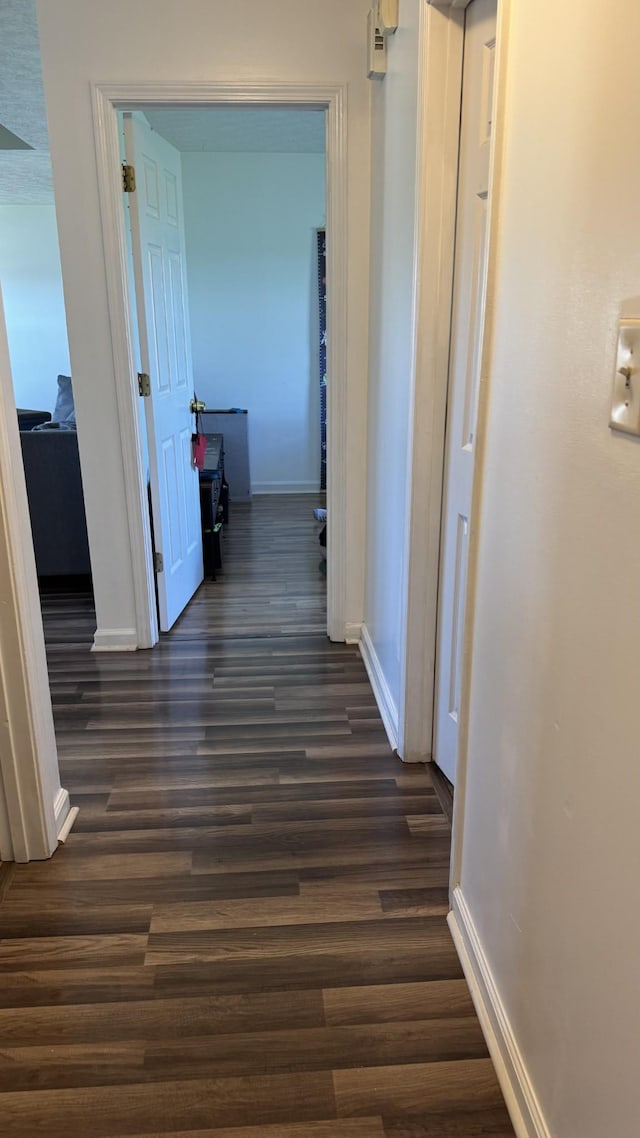 312 Pappy Dr, Oak Grove, KY 42262 - corridor with baseboards and dark wood finished floors