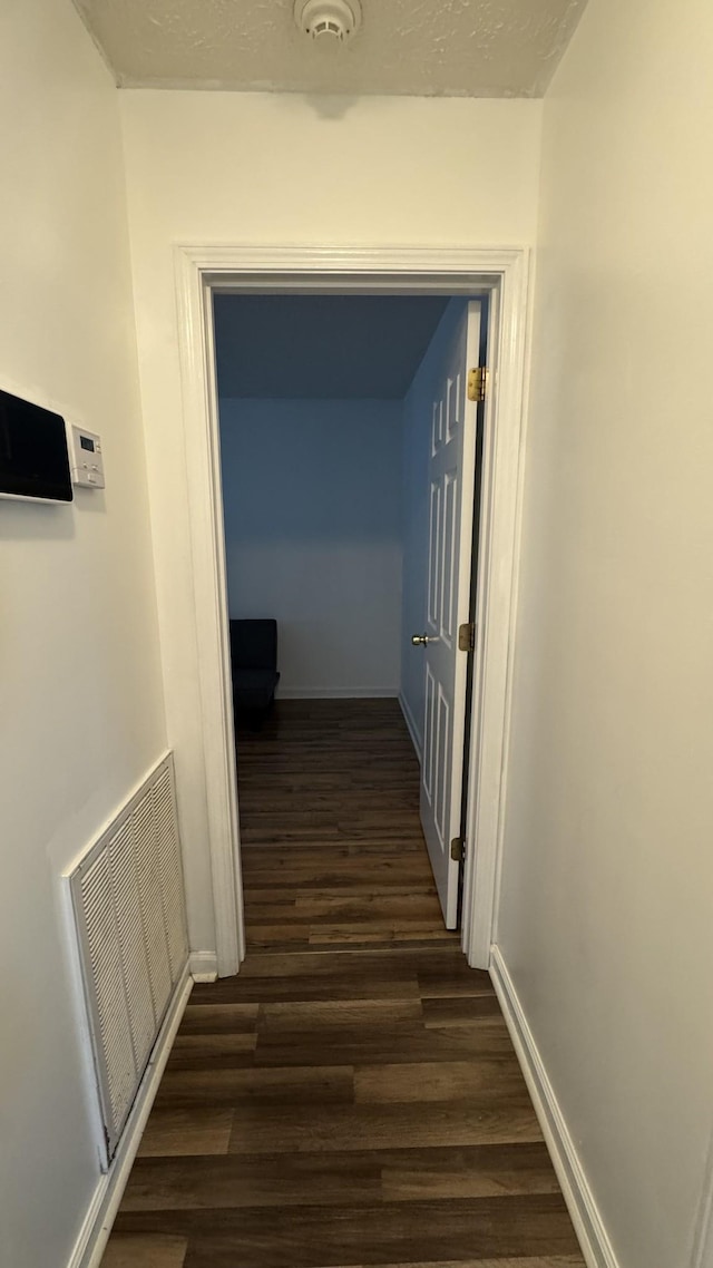 312 Pappy Dr, Oak Grove, KY 42262 - hall with dark wood finished floors and baseboards