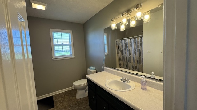 312 Pappy Dr, Oak Grove, KY 42262 - full bathroom with vanity, toilet, baseboards, a shower with shower curtain, and a textured ceiling