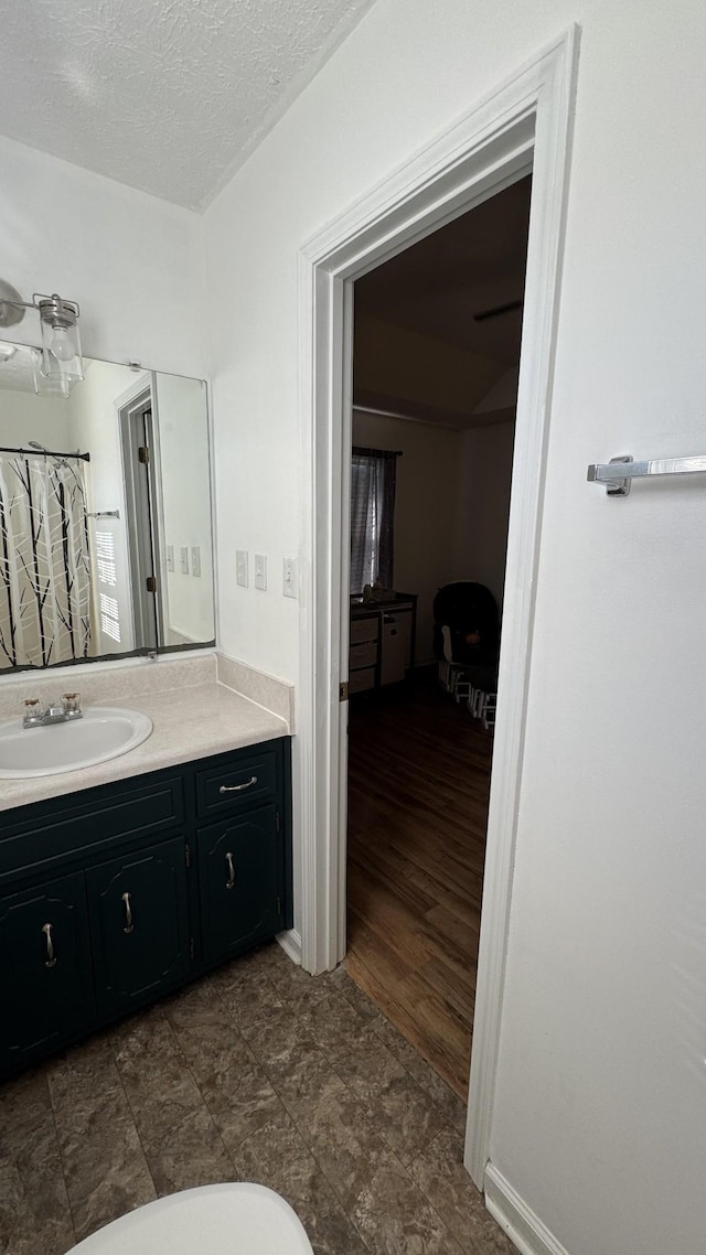 312 Pappy Dr, Oak Grove, KY 42262 - full bath featuring vanity and a textured ceiling