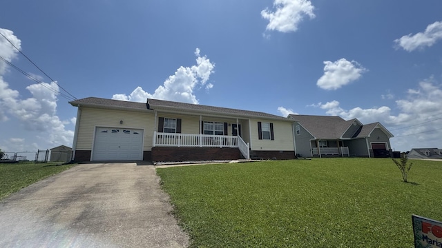 312 Pappy Dr, Oak Grove, KY 42262 - single story home with a porch, an attached garage, asphalt driveway, and crawl space