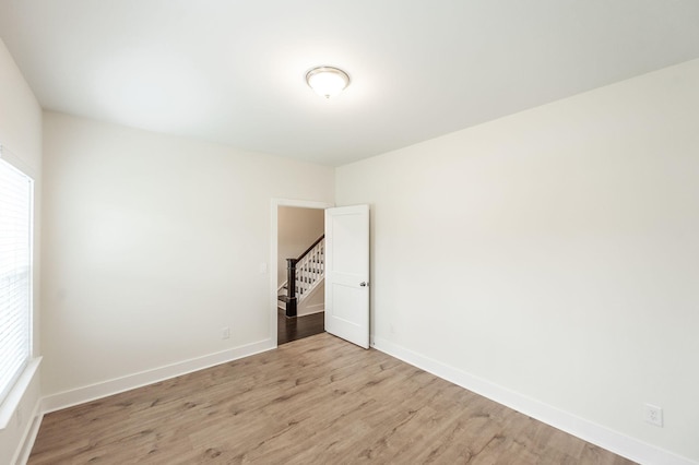 287 Cloverbrook Way, Gallatin, TN 37066 - empty room with light wood finished floors, plenty of natural light, stairs, and baseboards