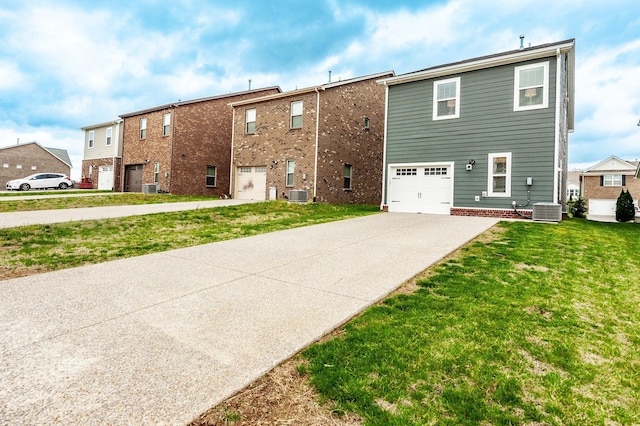 287 Cloverbrook Way, Gallatin, TN 37066 - view of front of property with central AC, driveway, a garage, and a front yard