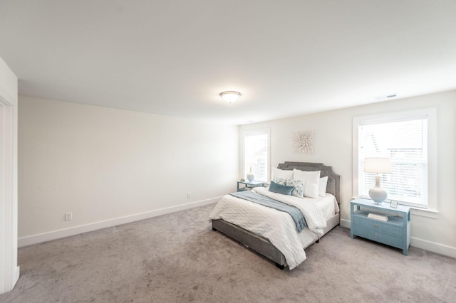 287 Cloverbrook Way, Gallatin, TN 37066 - bedroom with light colored carpet, multiple windows, and baseboards