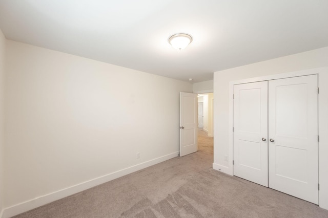 287 Cloverbrook Way, Gallatin, TN 37066 - unfurnished bedroom featuring light colored carpet, a closet, and baseboards