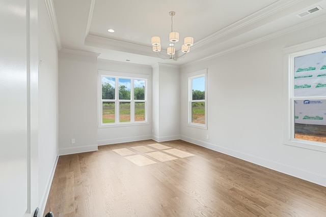 7100 Twelve Corners Rd, Lascassas, TN 37085 - spare room with a chandelier, crown molding, wood finished floors, a tray ceiling, and baseboards