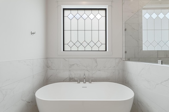 7100 Twelve Corners Rd, Lascassas, TN 37085 - full bathroom featuring a freestanding bath and tile walls