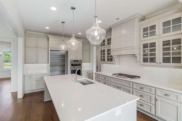 7100 Twelve Corners Rd, Lascassas, TN 37085 - kitchen with a sink, stainless steel appliances, a center island with sink, light countertops, and recessed lighting