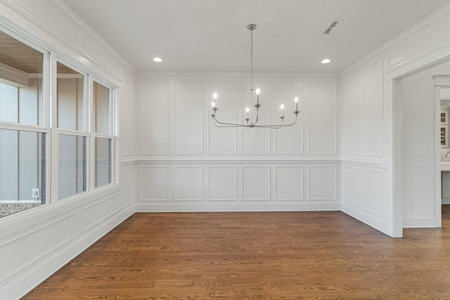 7100 Twelve Corners Rd, Lascassas, TN 37085 - unfurnished dining area featuring a decorative wall, a chandelier, recessed lighting, and dark wood-type flooring