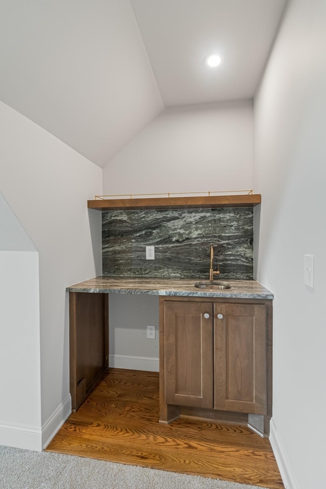 7100 Twelve Corners Rd, Lascassas, TN 37085 - indoor dry bar featuring wood finished floors, baseboards, and vaulted ceiling