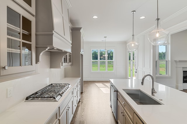 7100 Twelve Corners Rd, Lascassas, TN 37085 - kitchen featuring a sink, appliances with stainless steel finishes, light countertops, wood finished floors, and recessed lighting