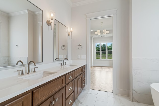 7100 Twelve Corners Rd, Lascassas, TN 37085 - full bathroom featuring a freestanding tub, double vanity, marble look tiles, ornamental molding, and a chandelier