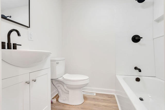 203 Summer St, Mount Pleasant, TN 38474 - bathroom featuring baseboards, wood finished floors, vanity, toilet, and shower / bath combination