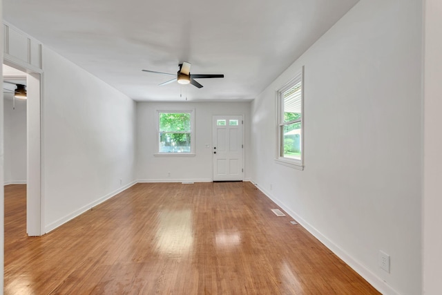 203 Summer St, Mount Pleasant, TN 38474 - foyer entrance featuring ceiling fan, light wood-type flooring, and baseboards