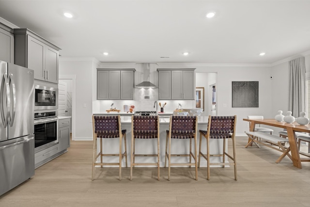4508 Cresto Loop, Murfreesboro, TN 37128 - kitchen featuring gray cabinetry, stainless steel appliances, wall chimney range hood, ornamental molding, and decorative backsplash