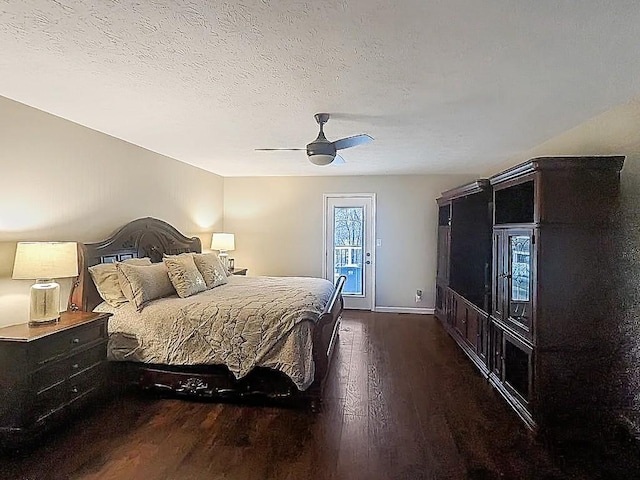 342 Drawbridge Trce, Paducah, KY 42003 - bedroom featuring wood finished floors, a ceiling fan, access to outside, and a textured ceiling