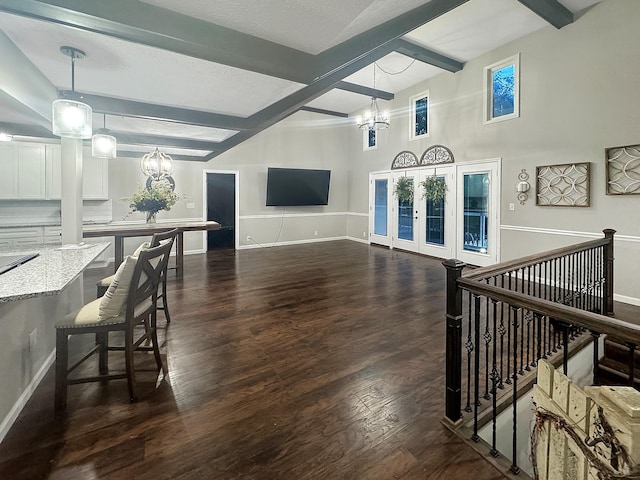 342 Drawbridge Trce, Paducah, KY 42003 - living room with a chandelier, beam ceiling, dark wood-style floors, and french doors