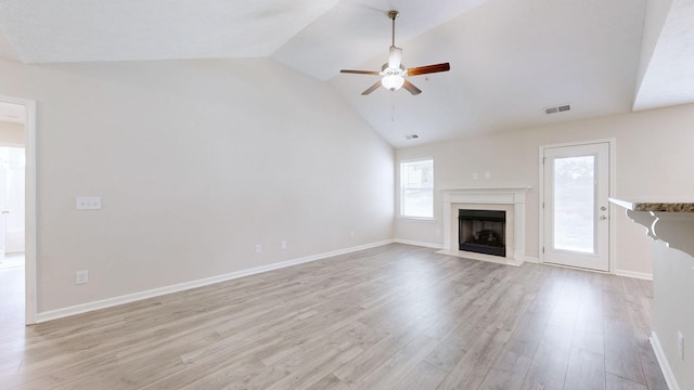 249 Edgefield Ct, Pleasant View, TN 37146 - unfurnished living room with ceiling fan, a high end fireplace, light wood-style flooring, and high vaulted ceiling