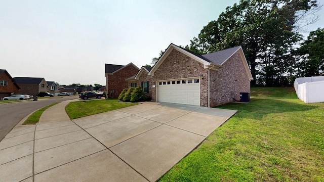 249 Edgefield Ct, Pleasant View, TN 37146 - view of side of property with a garage, driveway, a yard, and brick siding
