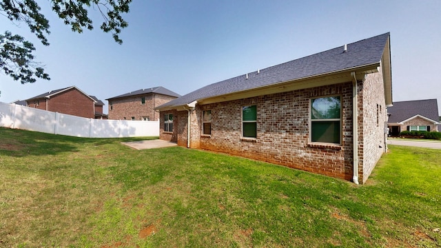 249 Edgefield Ct, Pleasant View, TN 37146 - rear view of house with brick siding, a patio area, and a shingled roof