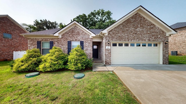 249 Edgefield Ct, Pleasant View, TN 37146 - view of front of house with an attached garage, concrete driveway, a front yard, and brick siding