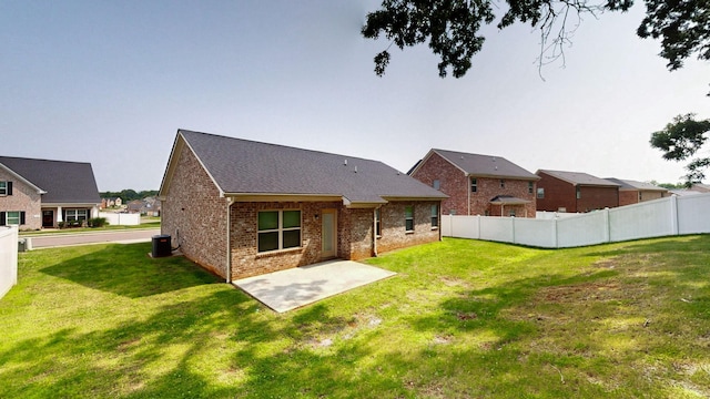 249 Edgefield Ct, Pleasant View, TN 37146 - rear view of house featuring brick siding, a patio area, and a shingled roof