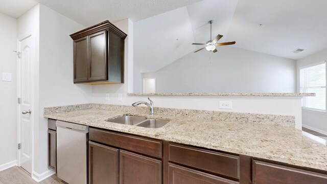 249 Edgefield Ct, Pleasant View, TN 37146 - kitchen with dishwasher, ceiling fan, dark brown cabinetry, light stone counters, and vaulted ceiling