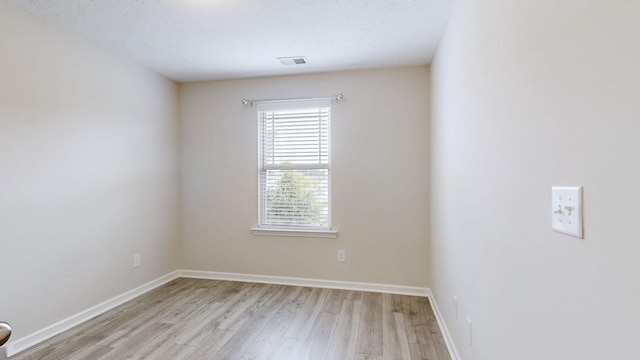 249 Edgefield Ct, Pleasant View, TN 37146 - unfurnished room featuring light wood-type flooring and baseboards