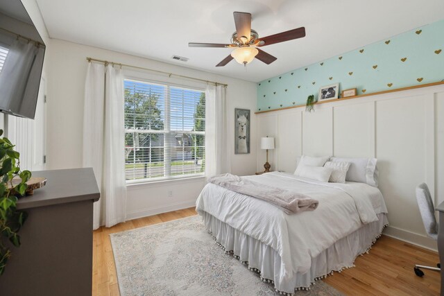 7579 Nightfall Cir, Ooltewah, TN 37363 - bedroom featuring light wood-style floors, baseboards, and ceiling fan