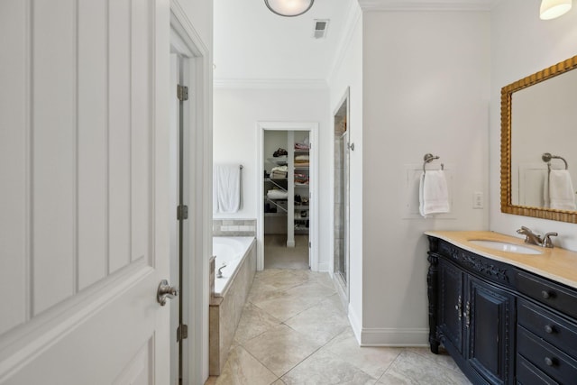 7579 Nightfall Cir, Ooltewah, TN 37363 - full bathroom with ornamental molding, vanity, a stall shower, a garden tub, and a spacious closet
