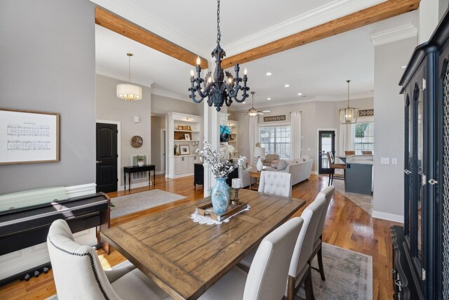 7579 Nightfall Cir, Ooltewah, TN 37363 - dining area featuring a chandelier, recessed lighting, ceiling fan, wood finished floors, and ornamental molding
