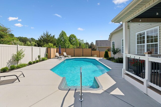 7579 Nightfall Cir, Ooltewah, TN 37363 - view of swimming pool featuring a patio area and a fenced backyard