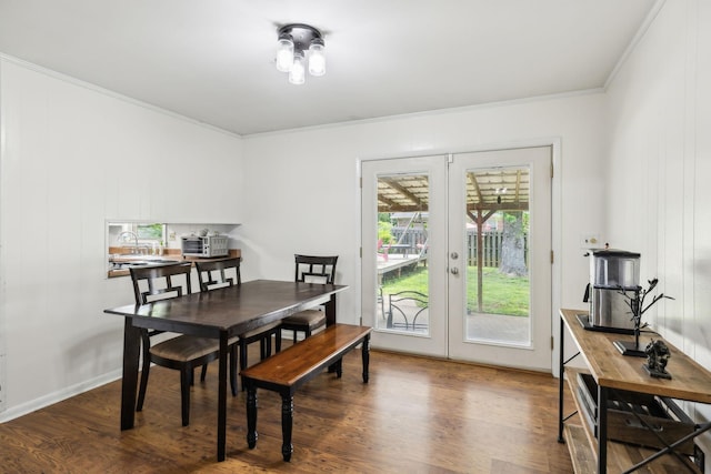 805 Springmont Dr, Hopkinsville, KY 42240 - dining area with french doors, wood finished floors, and ornamental molding