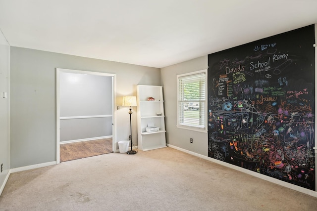 805 Springmont Dr, Hopkinsville, KY 42240 - unfurnished bedroom with carpet and baseboards