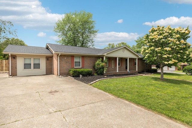 805 Springmont Dr, Hopkinsville, KY 42240 - ranch-style home featuring brick siding, concrete driveway, a porch, and roof with shingles