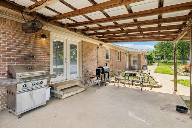 805 Springmont Dr, Hopkinsville, KY 42240 - view of patio / terrace featuring a grill, french doors, and entry steps